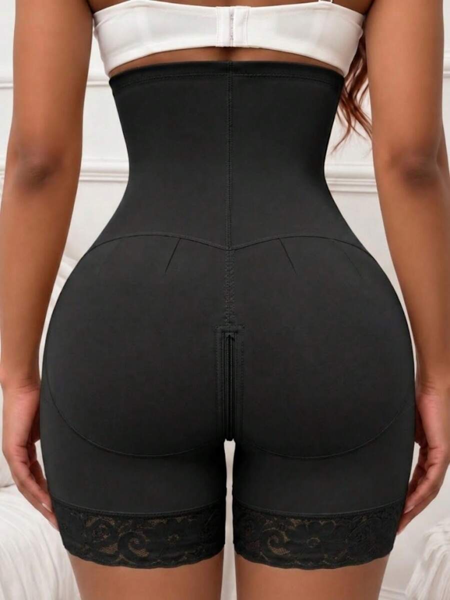 Women's high waist shaping shorts in apricot with zipper closure and tummy control features.