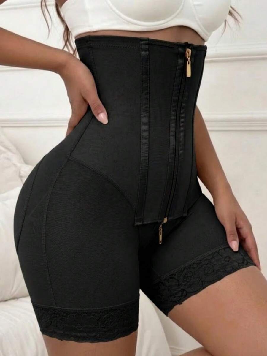 Women's high waist shaping shorts in apricot with zipper closure and tummy control features.