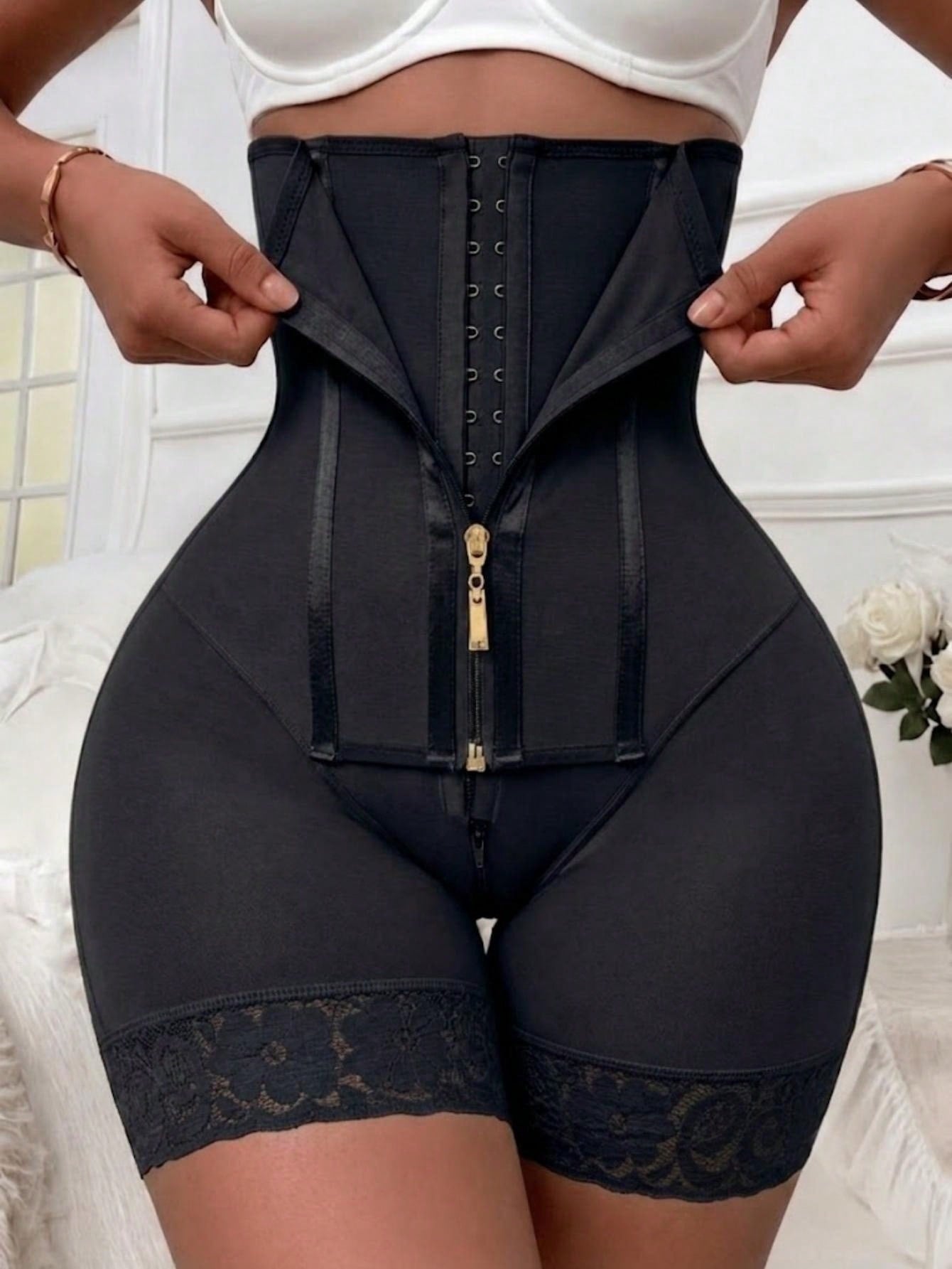 Women's high waist shaping shorts in apricot with zipper closure and tummy control features.