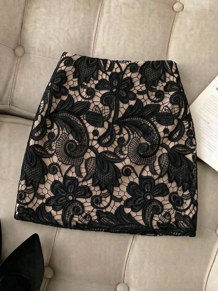 Women's short guipure lace skirt with lettuce trim and skinny mid-waist fit.
