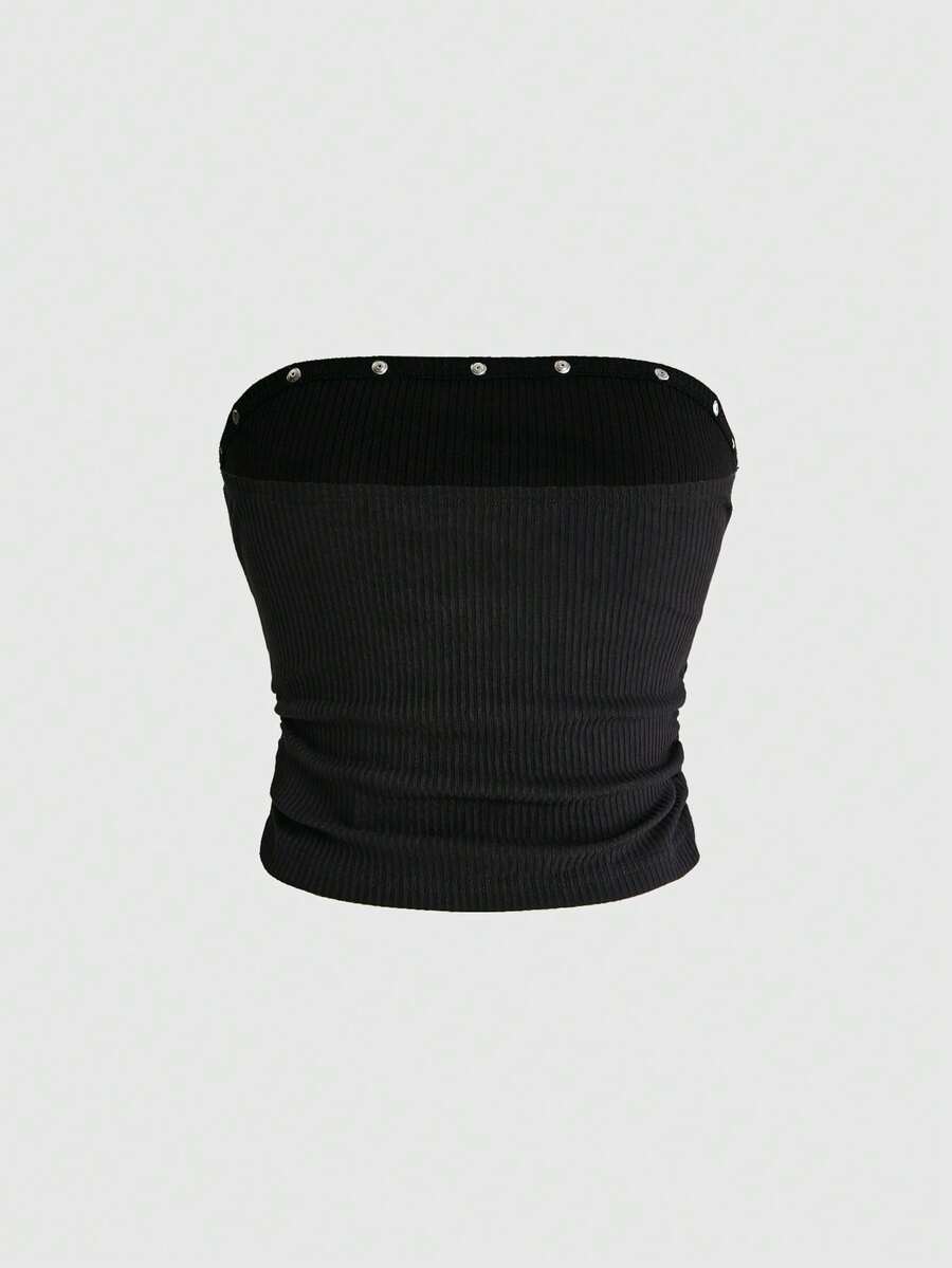 Black ribbed knit strapless crop tube top with an eye graphic print and star decor for women.
