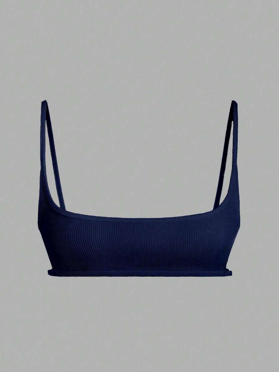 Women's black cropped camisole top with faux crocodile texture, backless spaghetti straps, and matching arm sleeves.