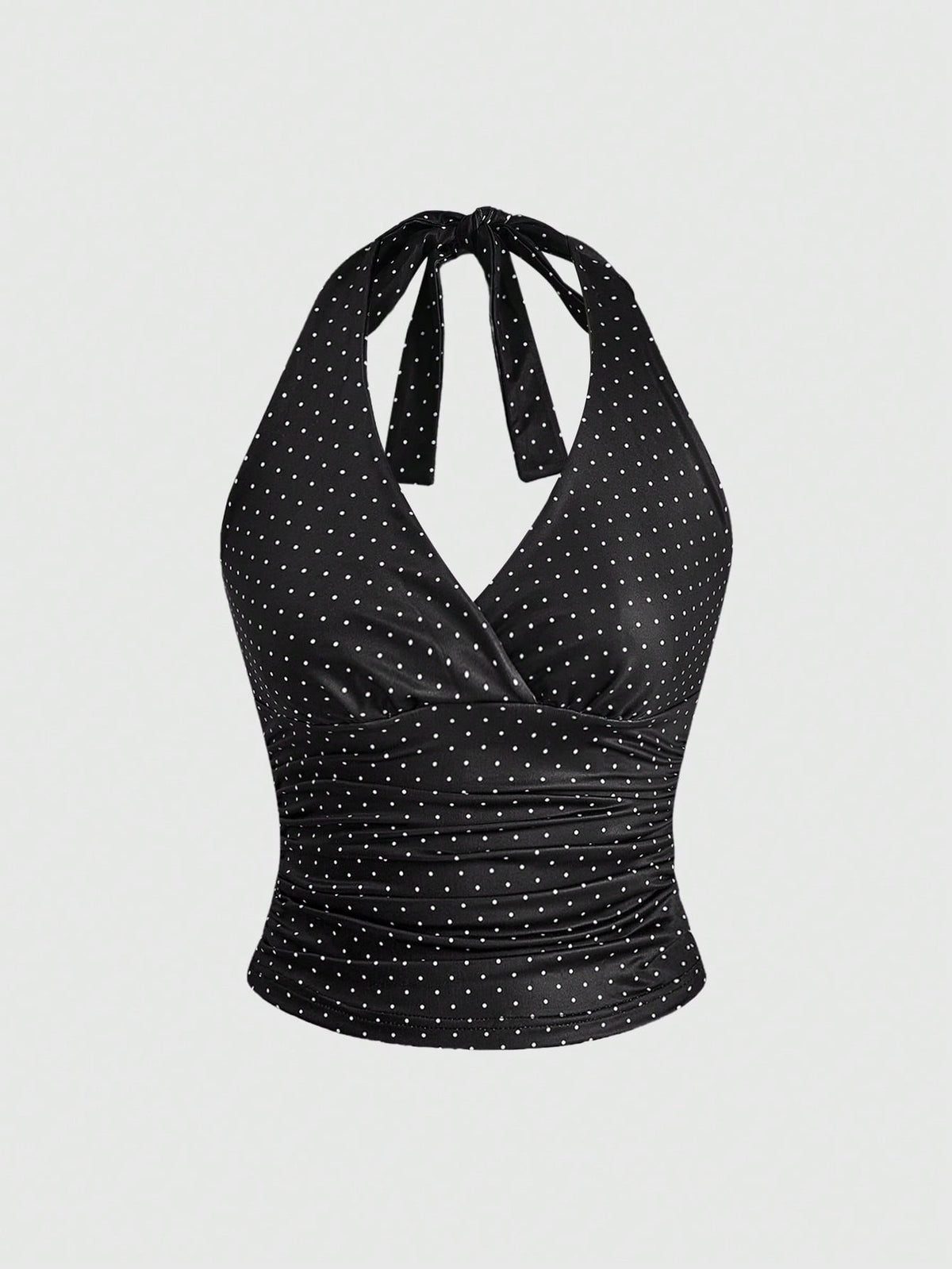 Women's halter crop tank top featuring a backless silhouette and ruched detailing in a slim fit design.