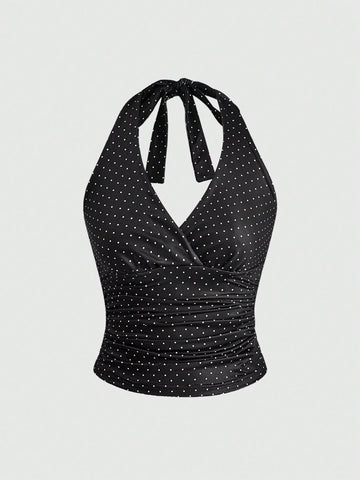 Women's halter crop tank top featuring a backless silhouette and ruched detailing in a slim fit design.