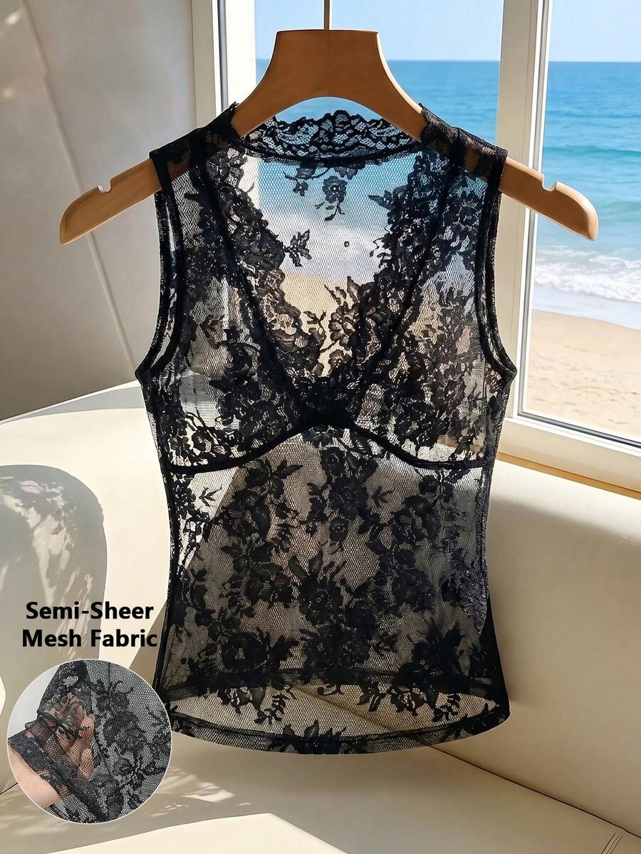 Franclia women's black semi-sheer lace camisole featuring a deep V-neckline with contrast lace trim in a slim fit sleeveless design.