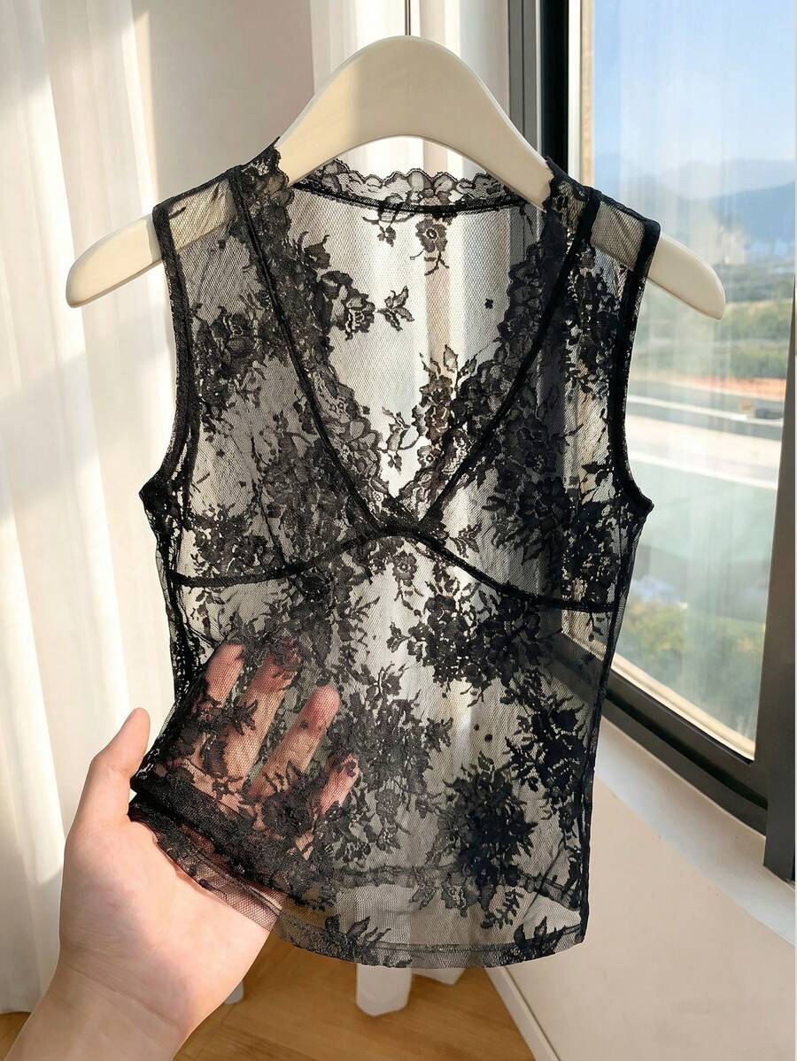 Franclia women's black semi-sheer lace camisole featuring a deep V-neckline with contrast lace trim in a slim fit sleeveless design.