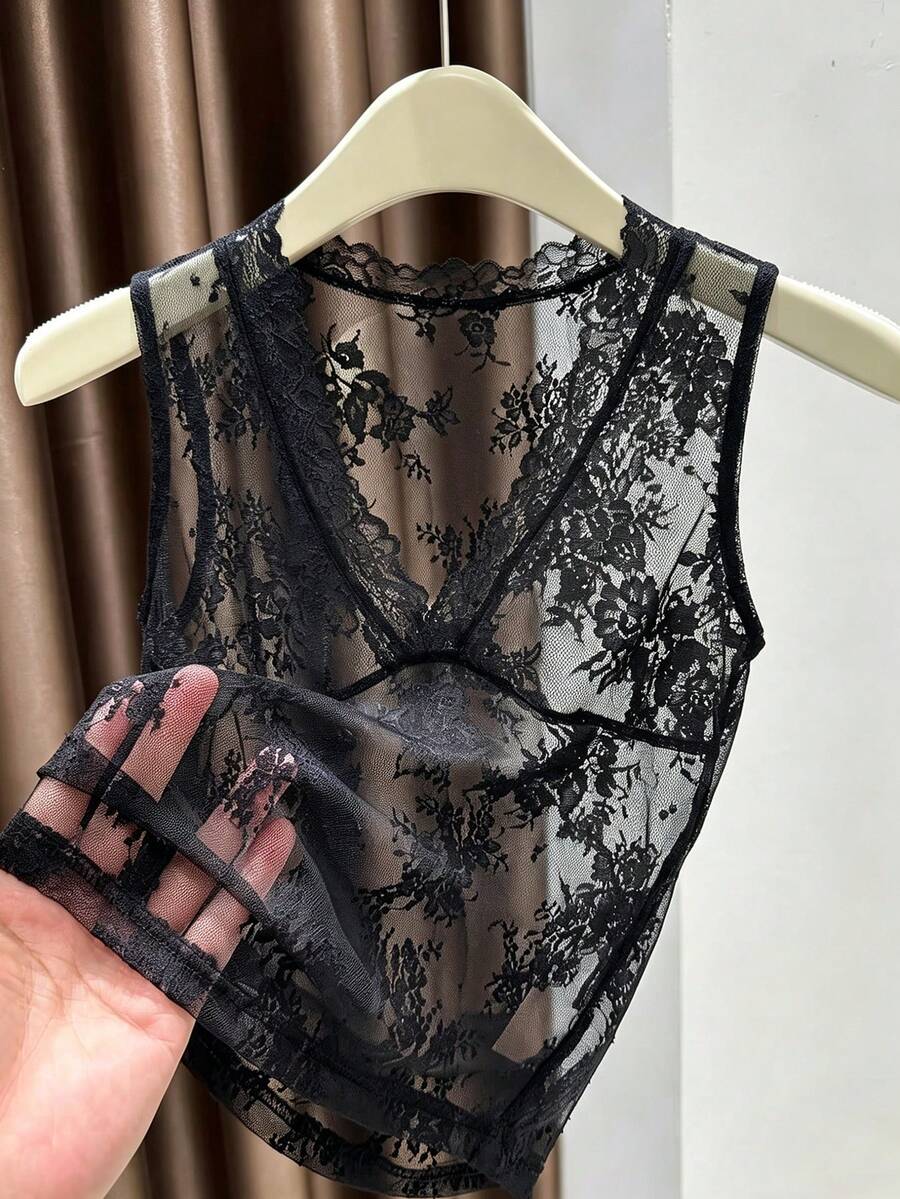 Franclia women's black semi-sheer lace camisole featuring a deep V-neckline with contrast lace trim in a slim fit sleeveless design.