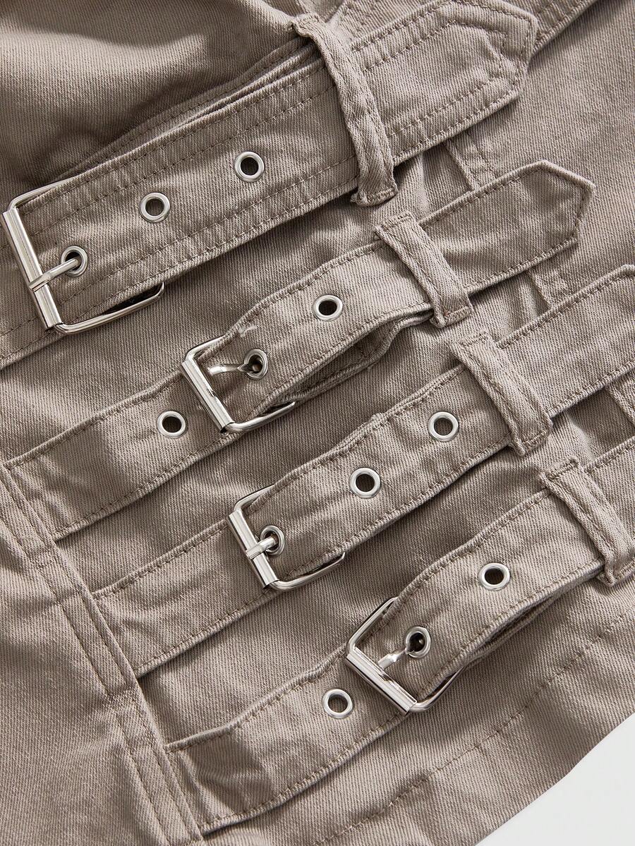 Khaki washed denim backless tank top featuring spaghetti straps, metal buckle detail, and slim fit for women.
