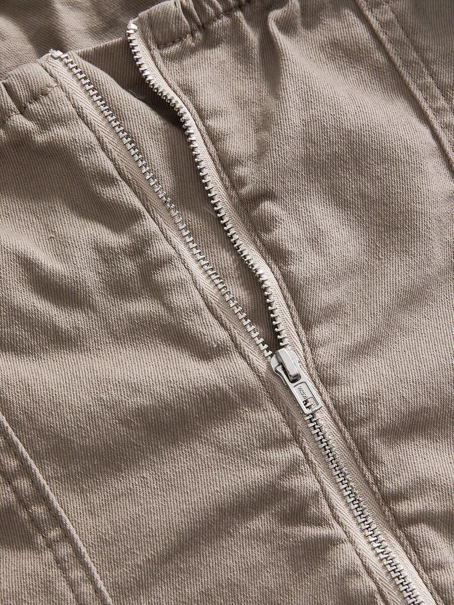 Khaki washed denim backless tank top featuring spaghetti straps, metal buckle detail, and slim fit for women.
