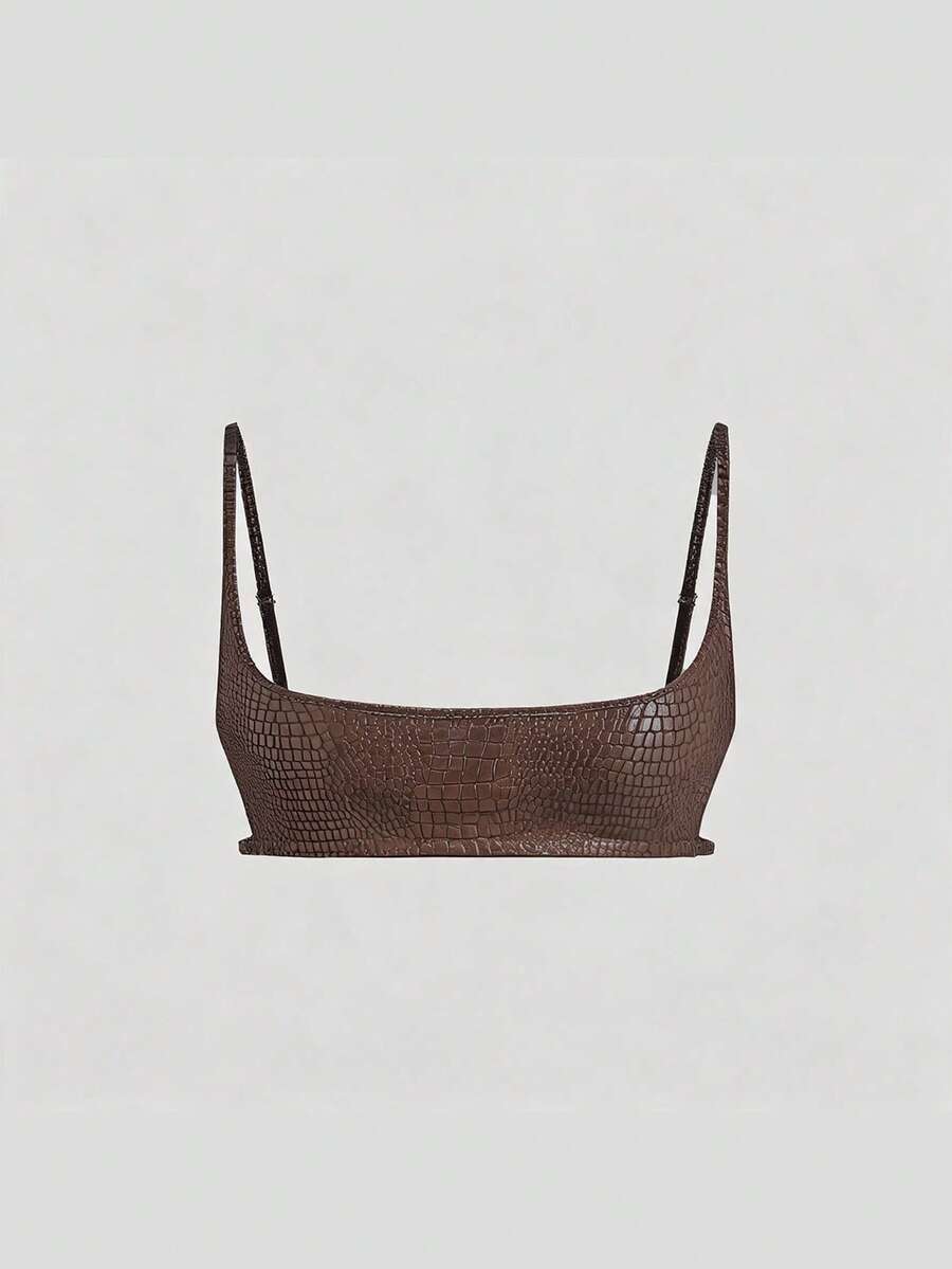 Women's black cropped camisole top with faux crocodile texture, backless spaghetti straps, and matching arm sleeves.