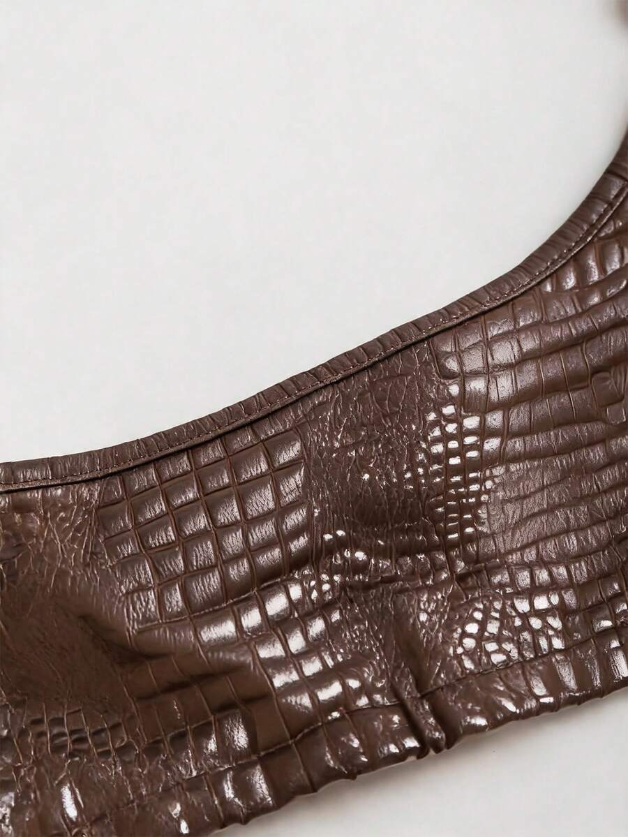 Women's black cropped camisole top with faux crocodile texture, backless spaghetti straps, and matching arm sleeves.