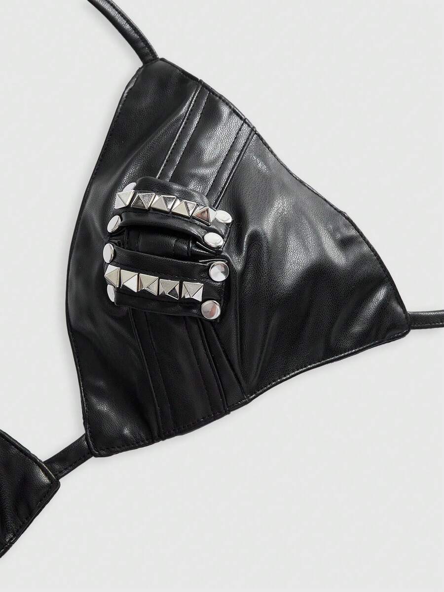 Black PU halter tank top featuring metal rivet design, triangle cups, micro crop length, and backless tie-back detail.