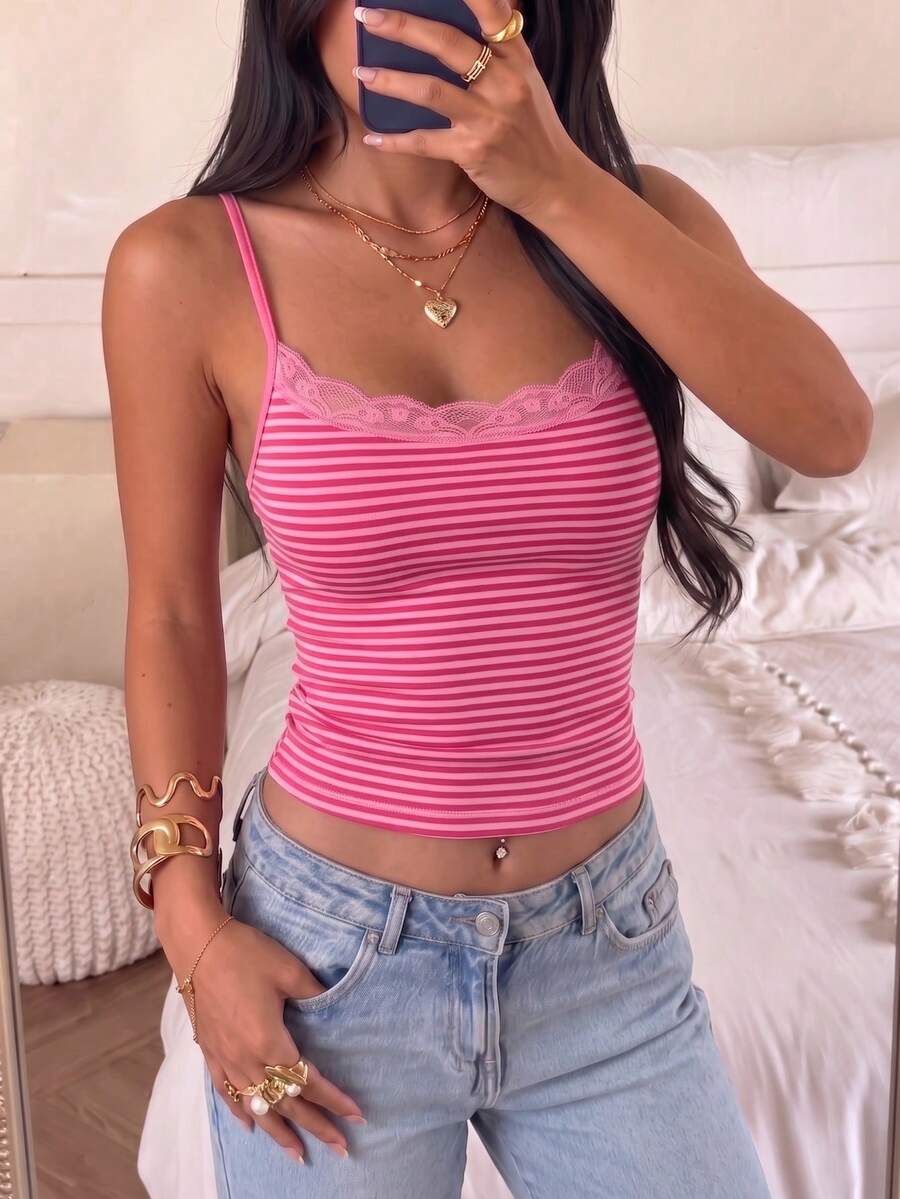 Black striped slim fit camisole top featuring contrast lace trim and delicate spaghetti straps.