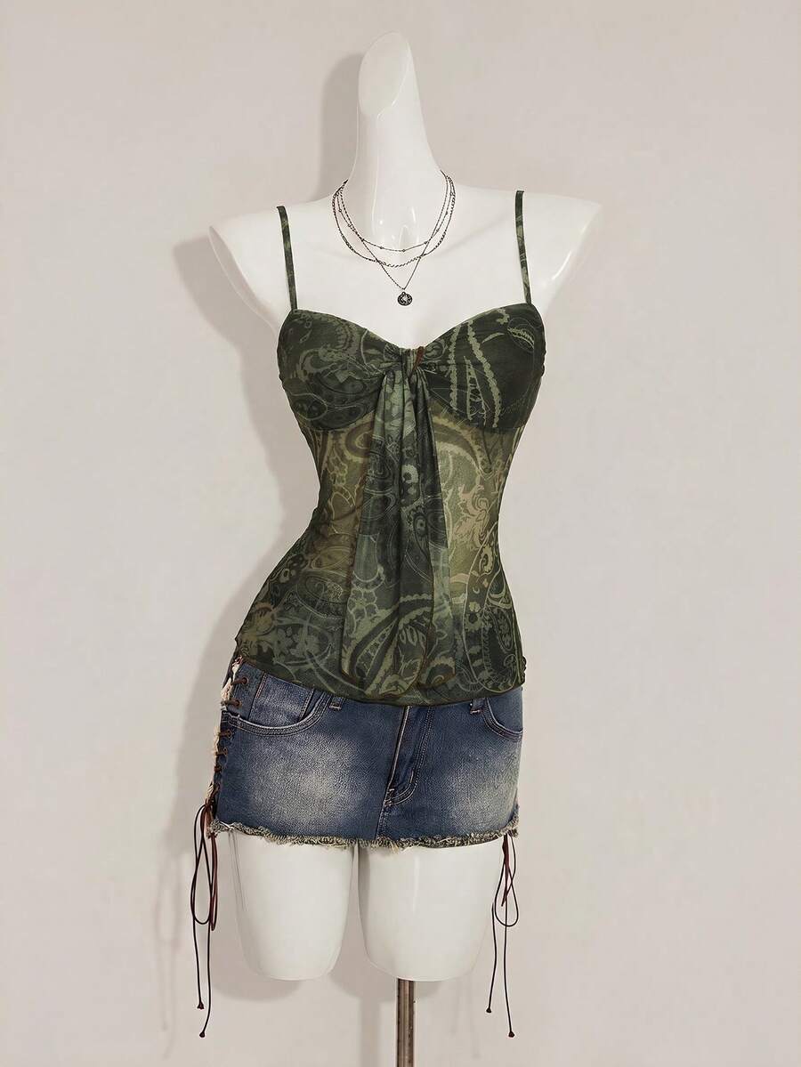 Burgundy paisley print ruched cami top for women featuring thin spaghetti straps, asymmetrical lace-up detail, and a slim fit.