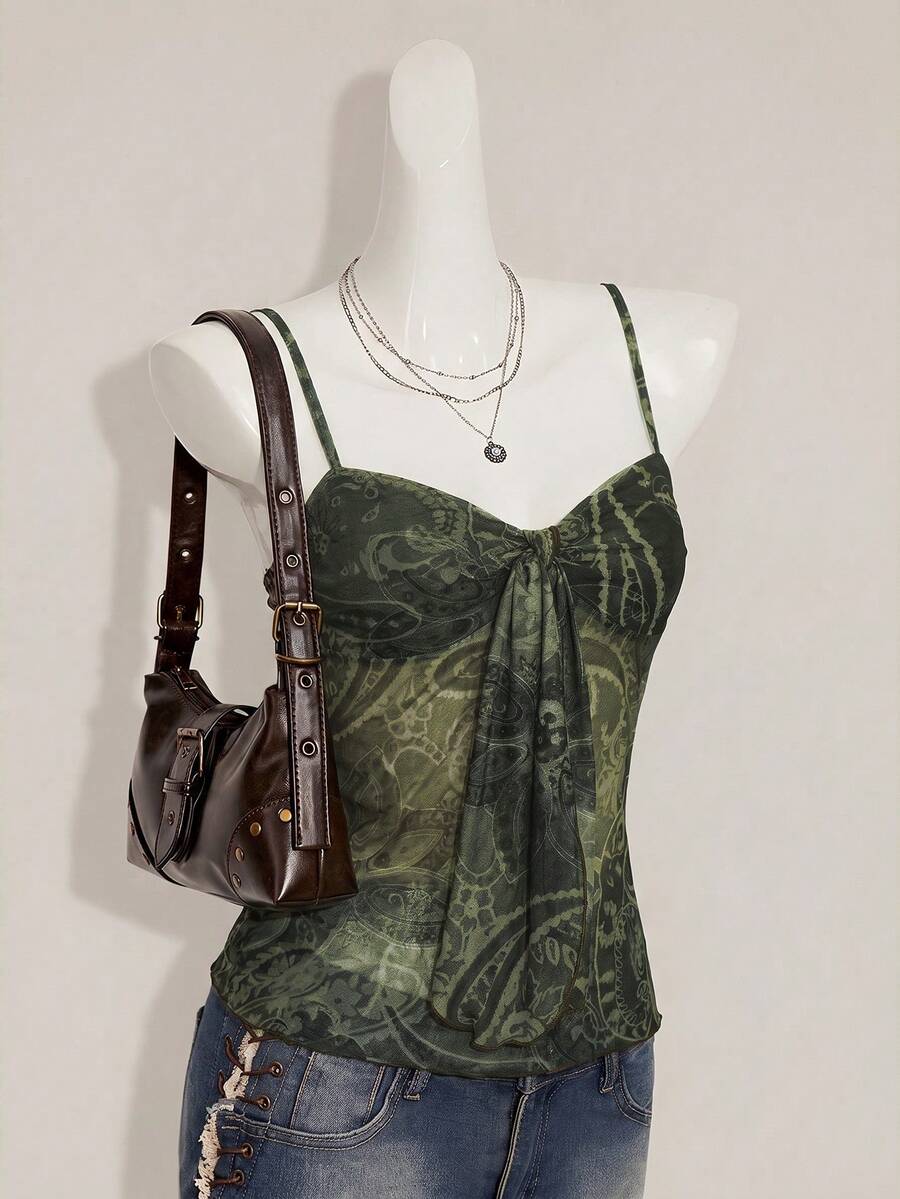 Burgundy paisley print ruched cami top for women featuring thin spaghetti straps, asymmetrical lace-up detail, and a slim fit.