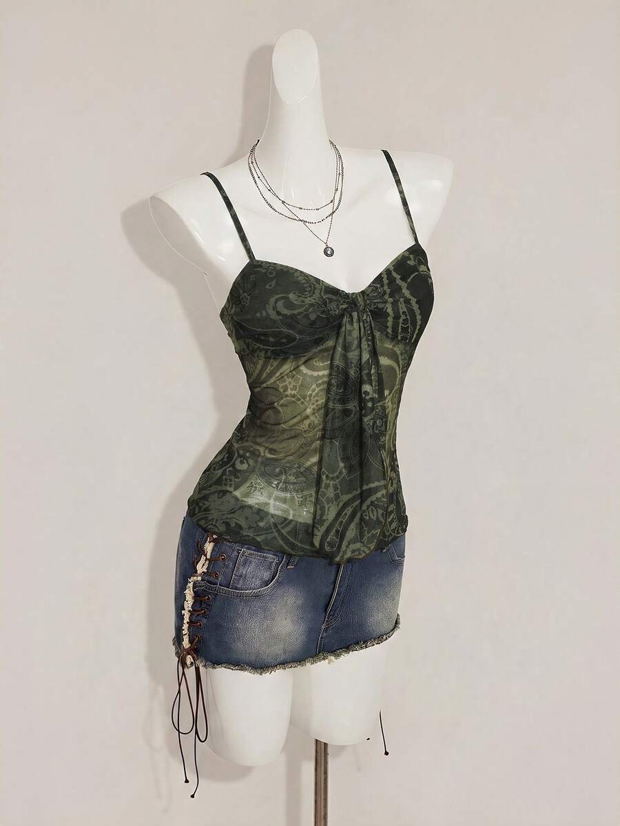 Burgundy paisley print ruched cami top for women featuring thin spaghetti straps, asymmetrical lace-up detail, and a slim fit.