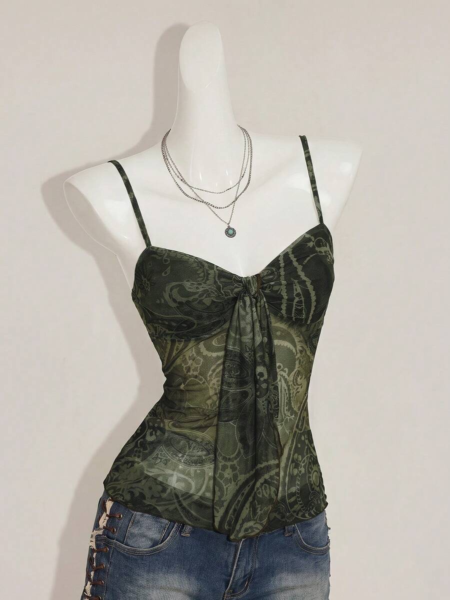 Burgundy paisley print ruched cami top for women featuring thin spaghetti straps, asymmetrical lace-up detail, and a slim fit.