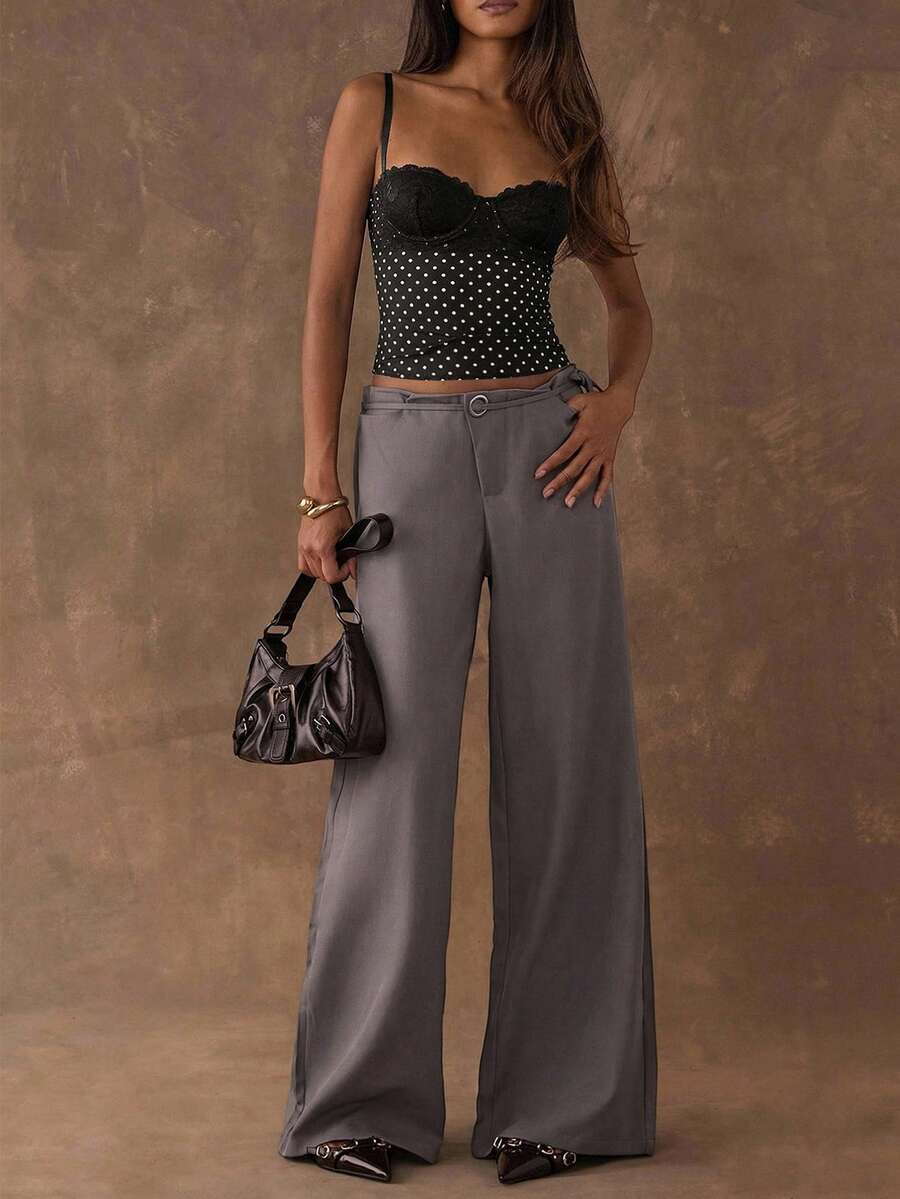 Women's black contrast lace camisole with spaghetti straps, cup detail, semi-sheer finish, and slim fit for going out or date night.
