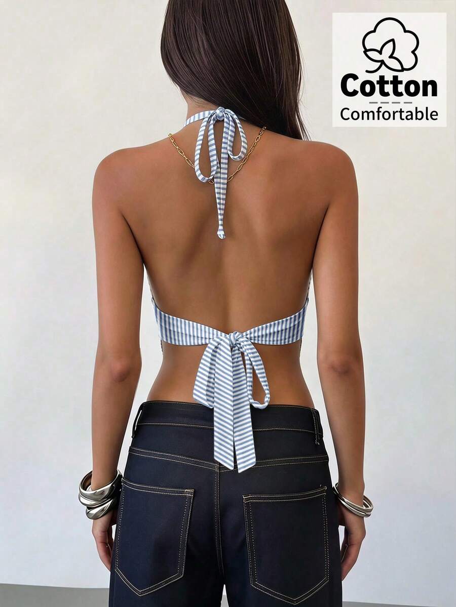 Women's black faux leather backless cami top with spaghetti straps and lace-up shirred sides.