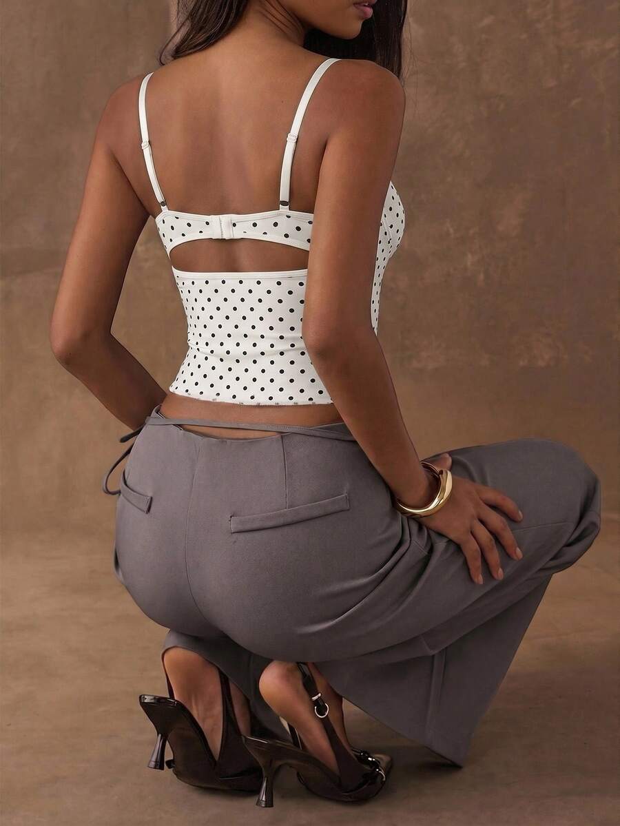 Women's black contrast lace camisole with spaghetti straps, cup detail, semi-sheer finish, and slim fit for going out or date night.