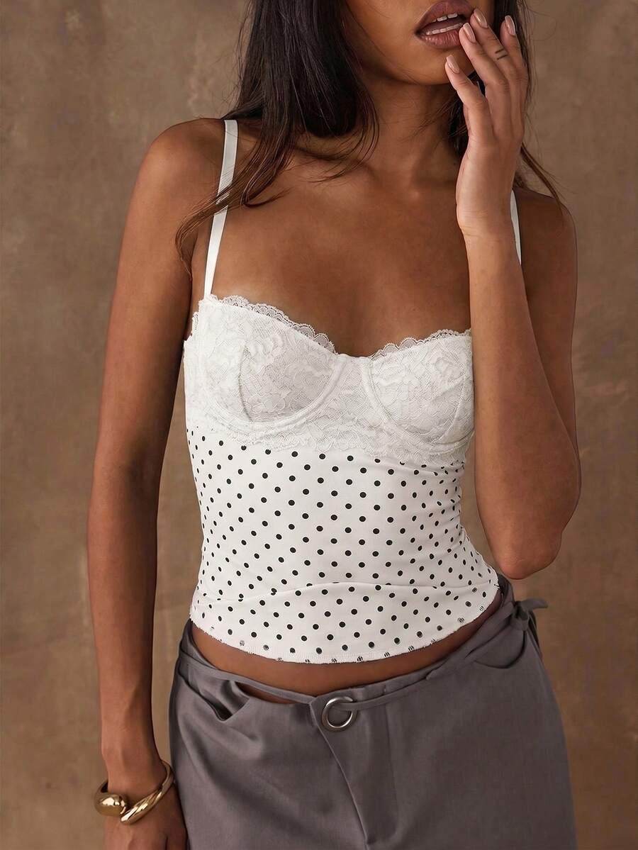 Women's black contrast lace camisole with spaghetti straps, cup detail, semi-sheer finish, and slim fit for going out or date night.