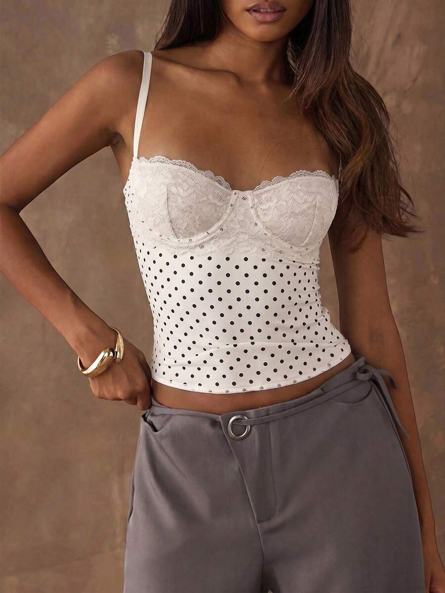 Women's black contrast lace camisole with spaghetti straps, cup detail, semi-sheer finish, and slim fit for going out or date night.