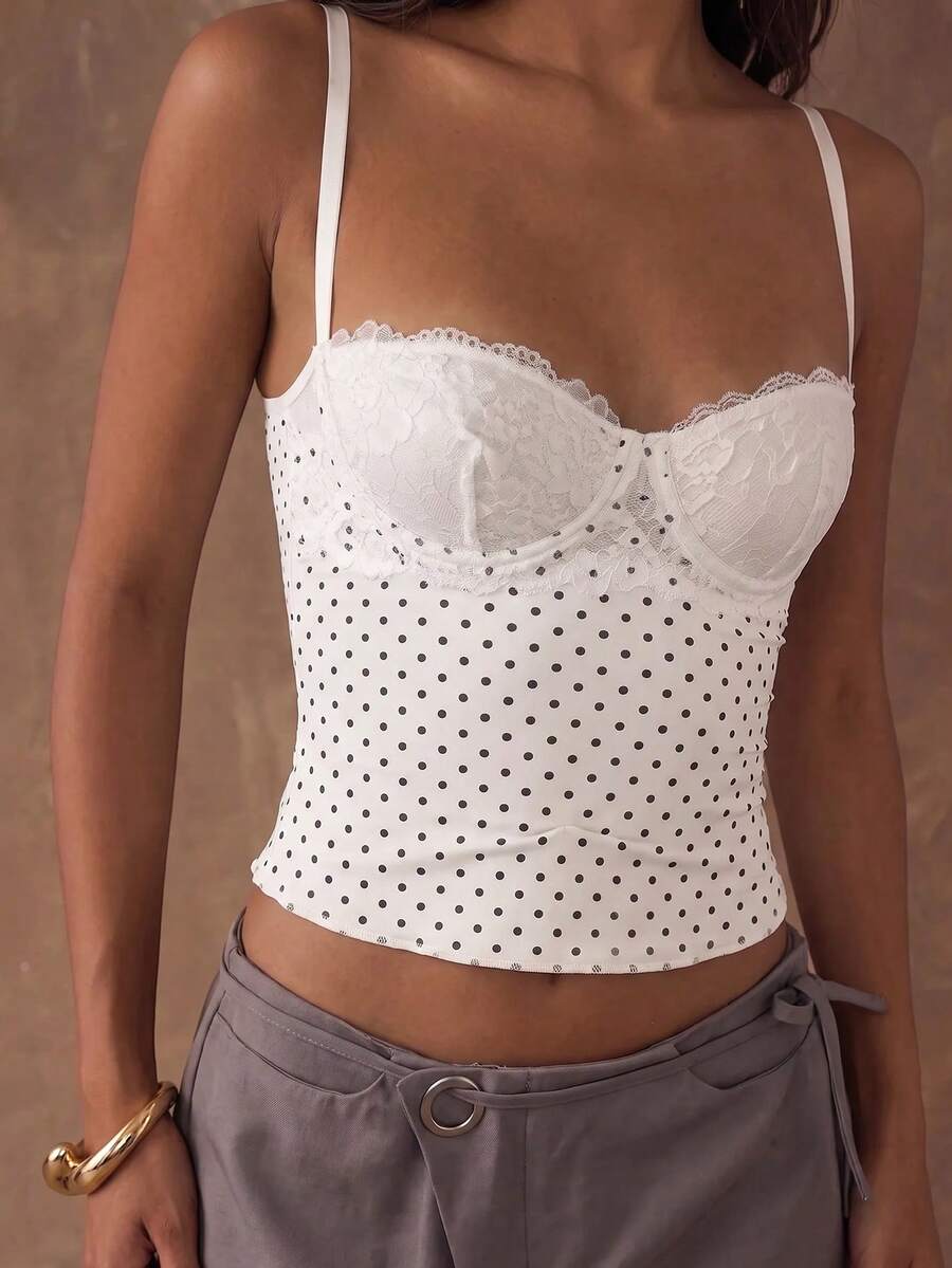 Women's black contrast lace camisole with spaghetti straps, cup detail, semi-sheer finish, and slim fit for going out or date night.