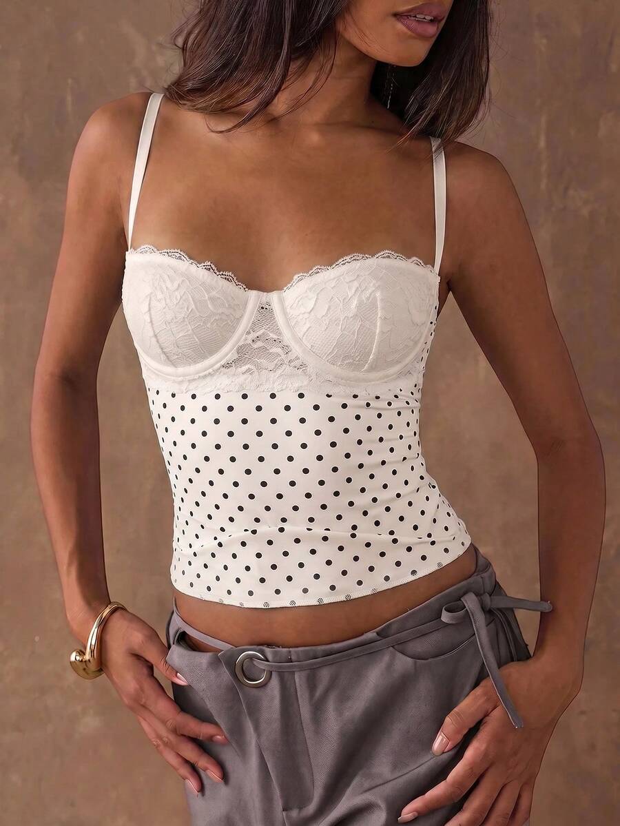 Women's black contrast lace camisole with spaghetti straps, cup detail, semi-sheer finish, and slim fit for going out or date night.