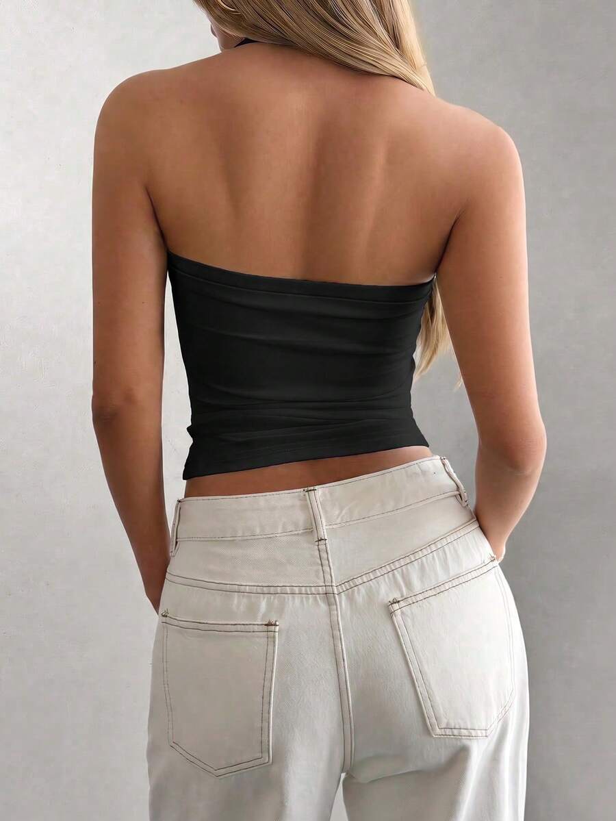 Women's striped halter camisole top featuring a backless design in knitted fabric