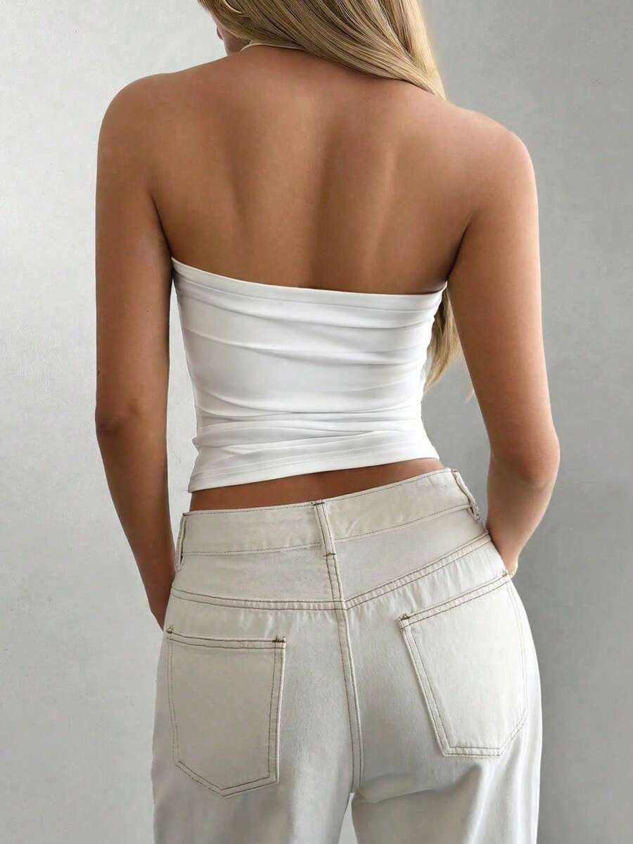 Women's striped halter camisole top featuring a backless design in knitted fabric