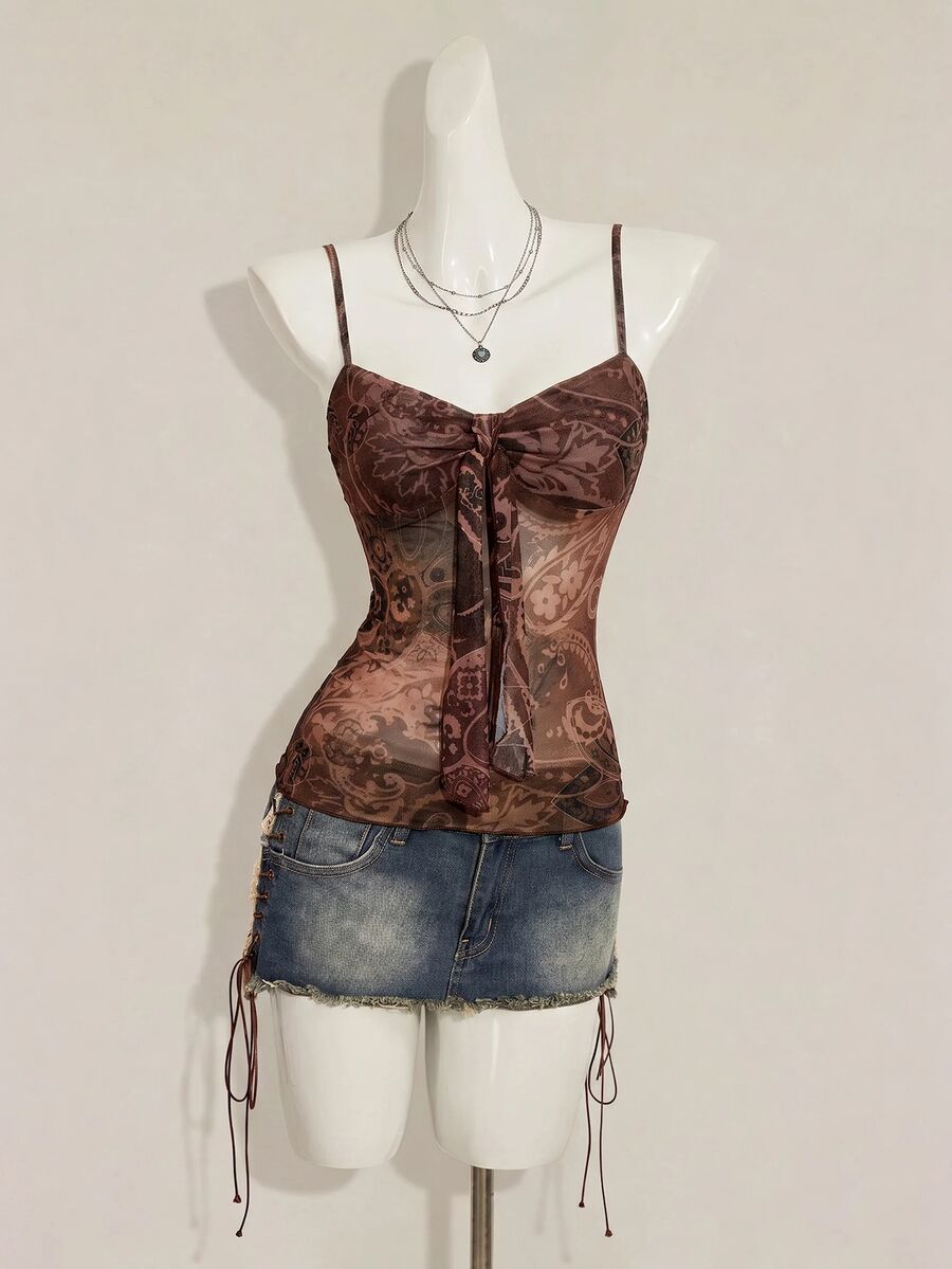 Burgundy paisley print ruched cami top for women featuring thin spaghetti straps, asymmetrical lace-up detail, and a slim fit.