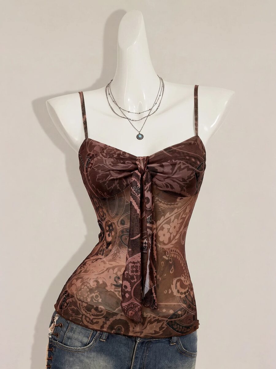 Burgundy paisley print ruched cami top for women featuring thin spaghetti straps, asymmetrical lace-up detail, and a slim fit.