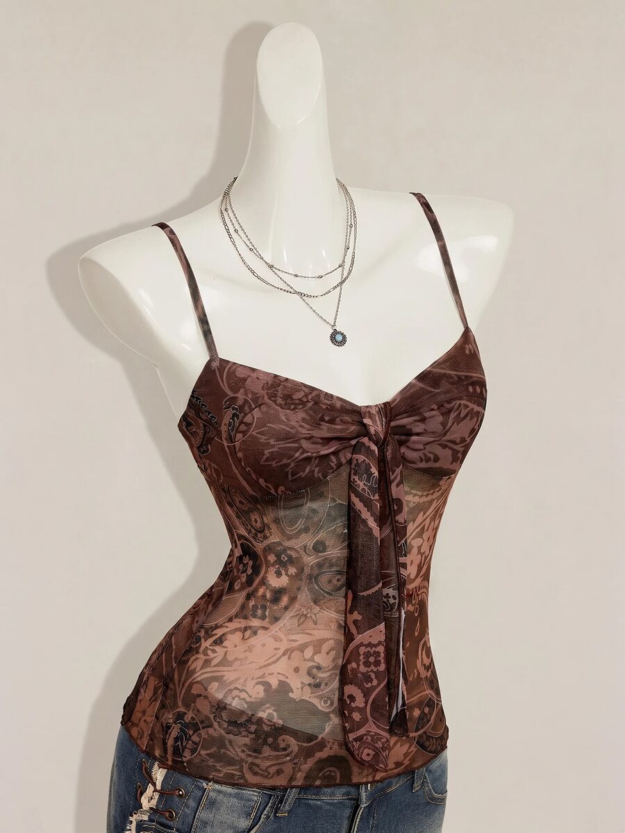 Burgundy paisley print ruched cami top for women featuring thin spaghetti straps, asymmetrical lace-up detail, and a slim fit.