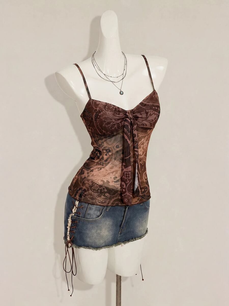 Burgundy paisley print ruched cami top for women featuring thin spaghetti straps, asymmetrical lace-up detail, and a slim fit.