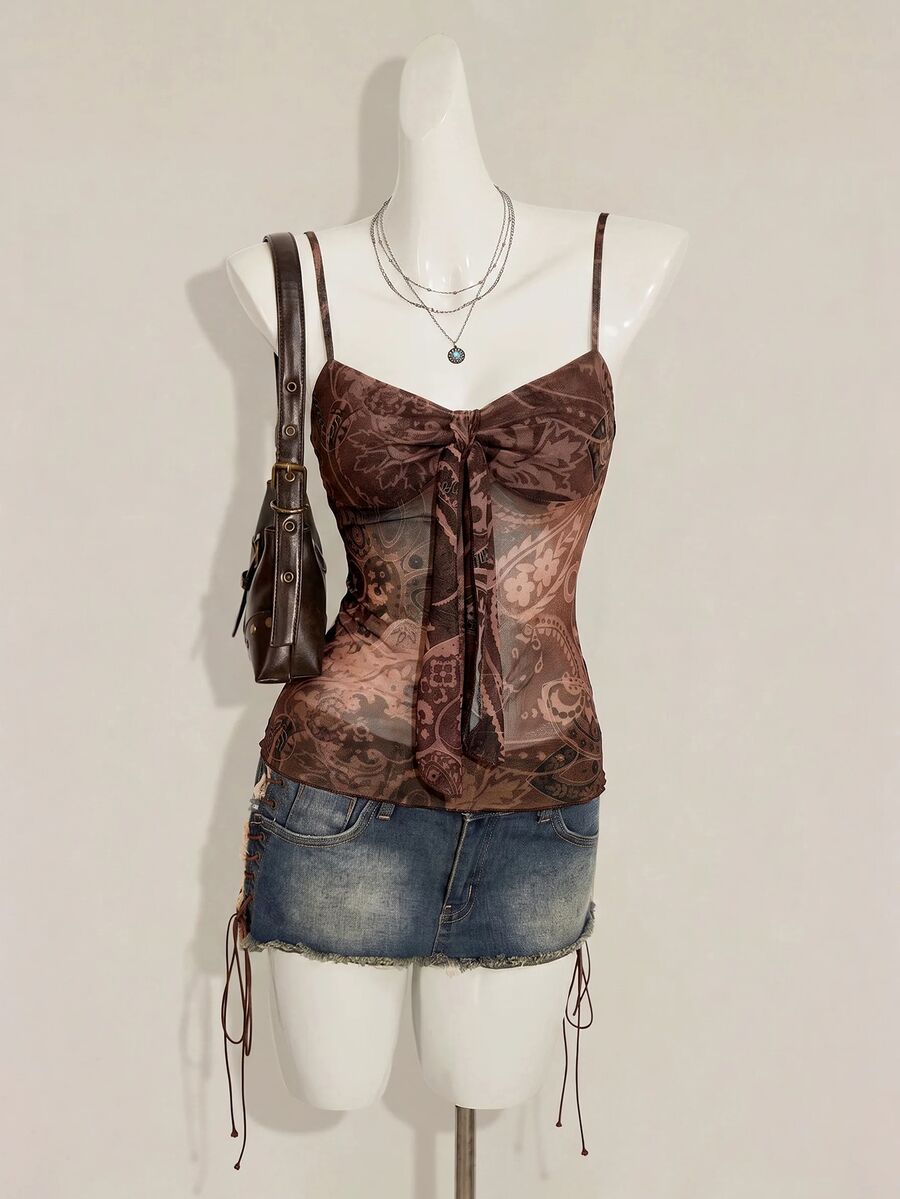 Burgundy paisley print ruched cami top for women featuring thin spaghetti straps, asymmetrical lace-up detail, and a slim fit.