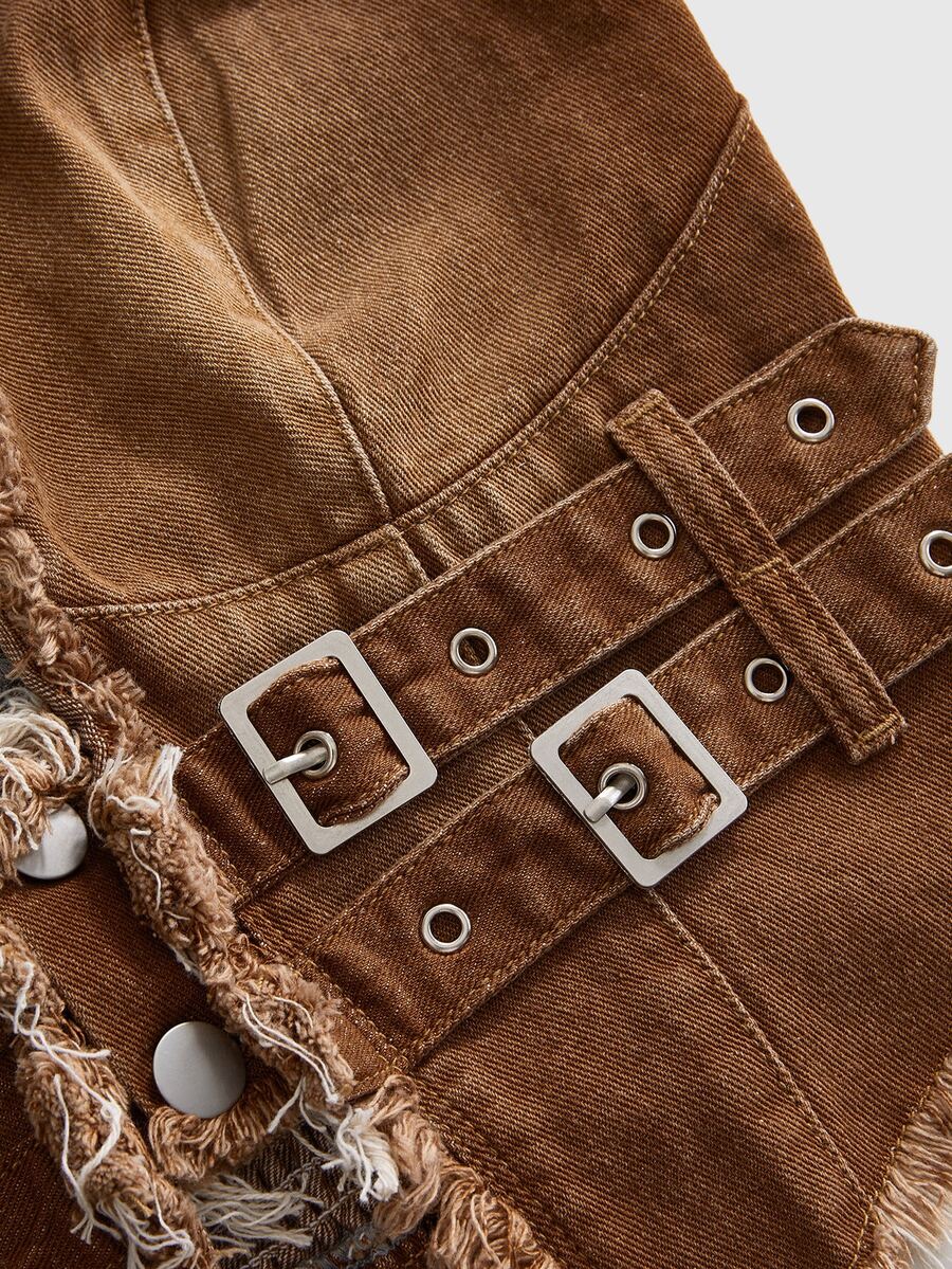 Women's denim halter crop top featuring a backless design, asymmetrical hem, single-breasted front, and lettuce trim.