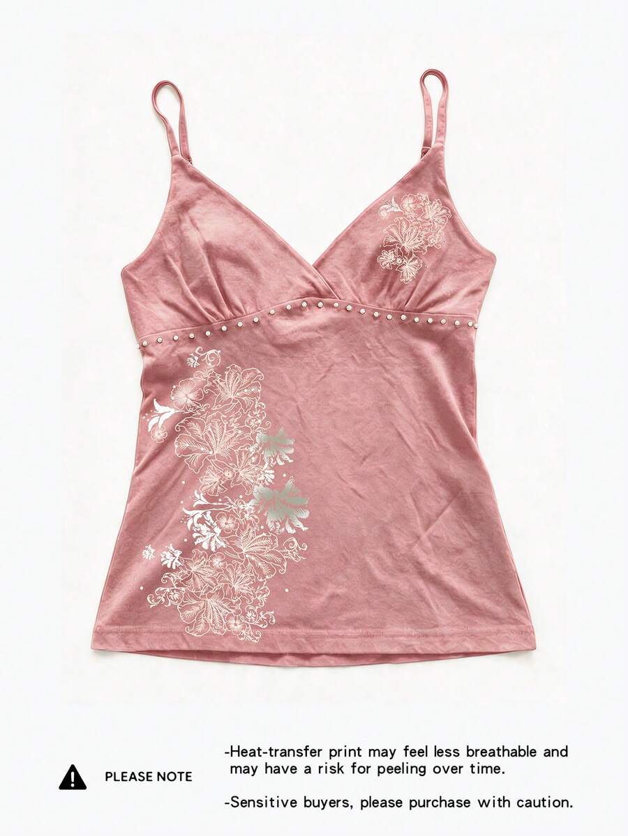Women's slim fit spaghetti strap cami top featuring a tropical hibiscus floral graphic print.