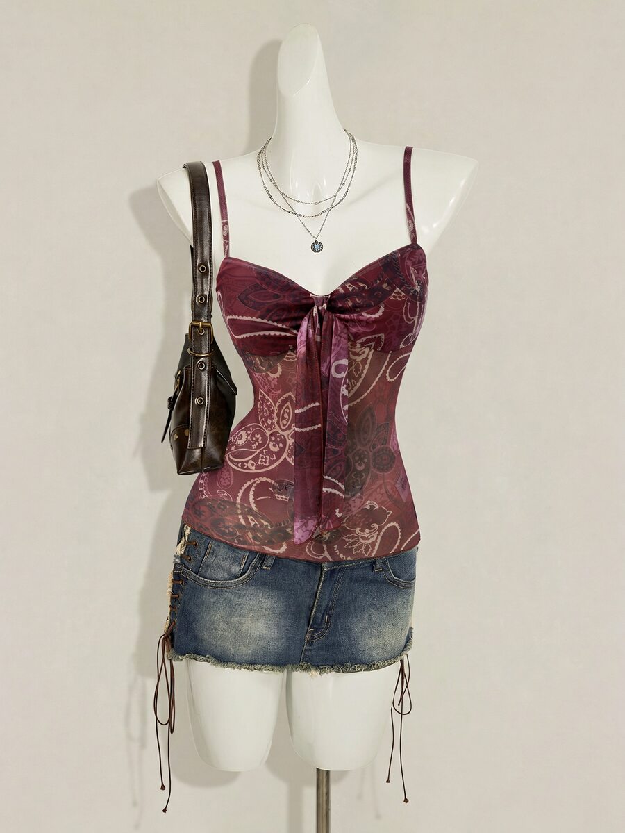 Burgundy paisley print ruched cami top for women featuring thin spaghetti straps, asymmetrical lace-up detail, and a slim fit.