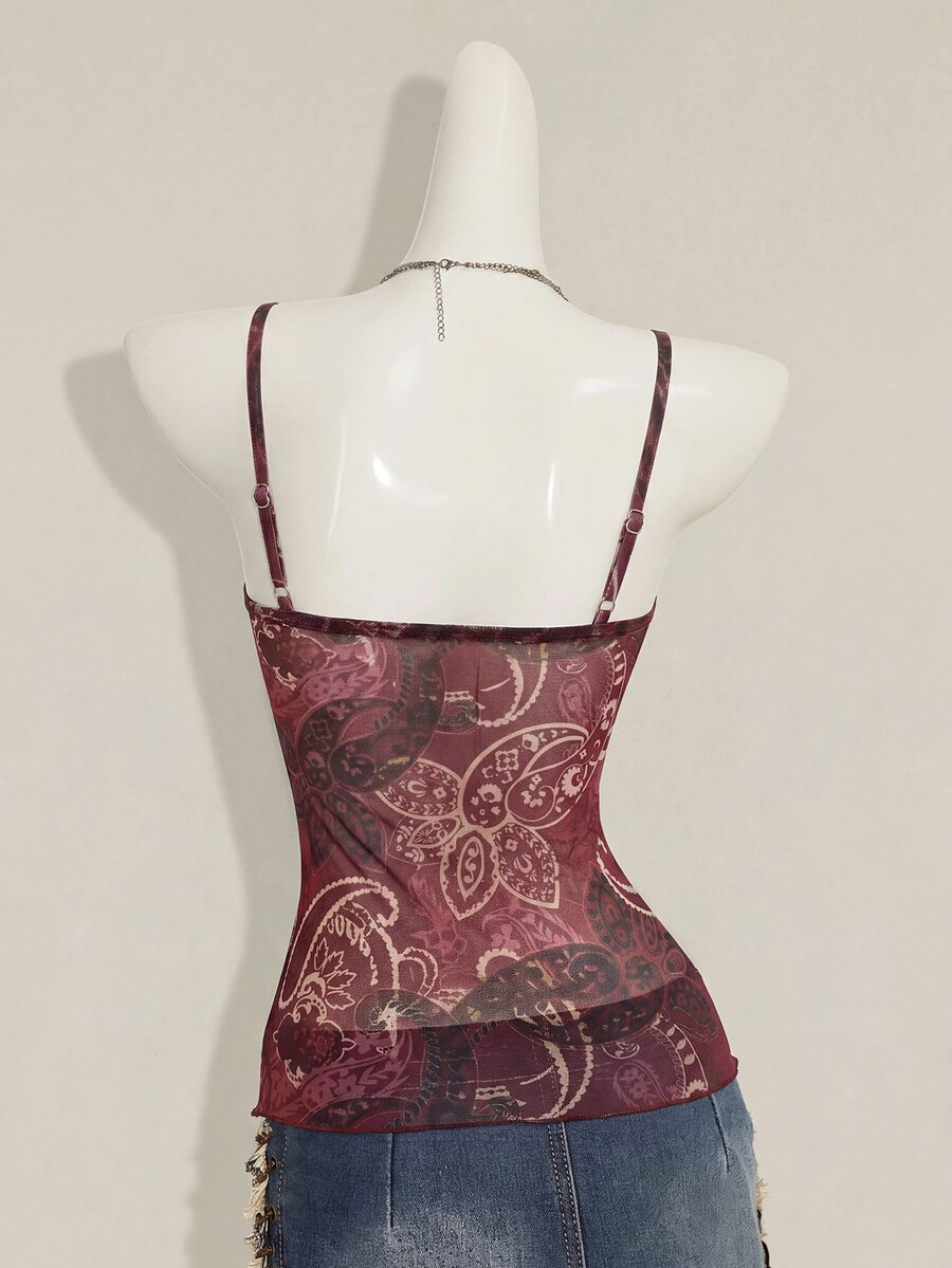 Burgundy paisley print ruched cami top for women featuring thin spaghetti straps, asymmetrical lace-up detail, and a slim fit.
