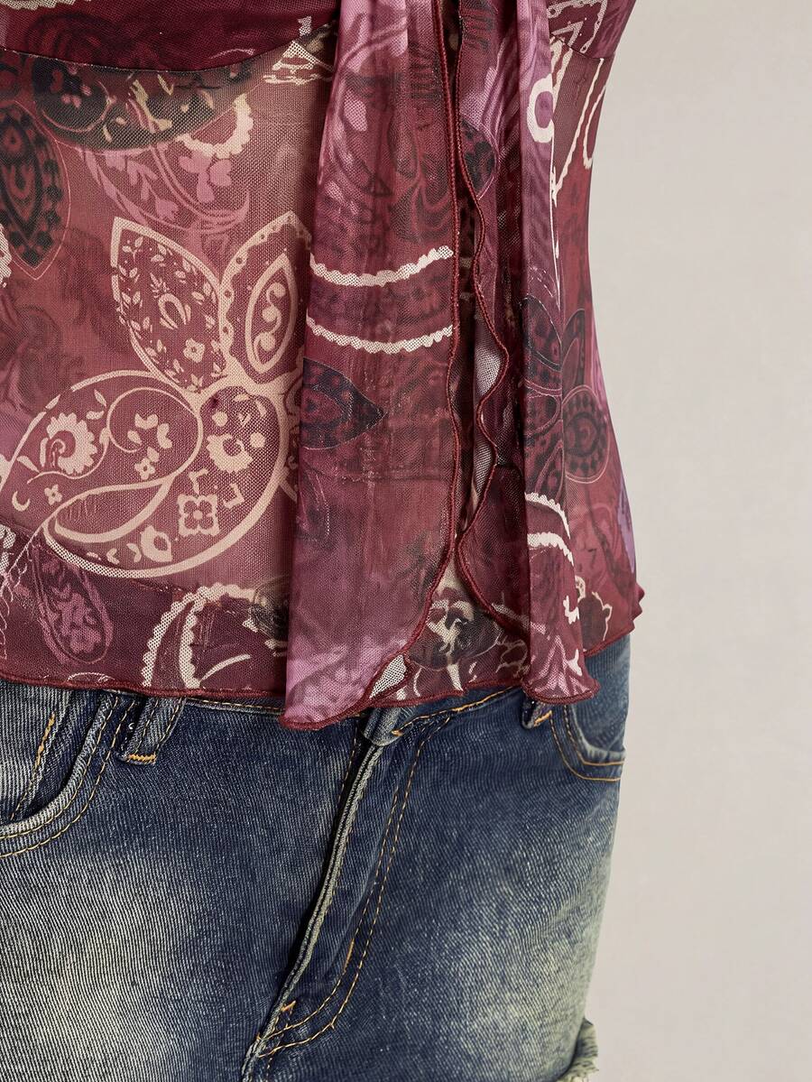 Burgundy paisley print ruched cami top for women featuring thin spaghetti straps, asymmetrical lace-up detail, and a slim fit.