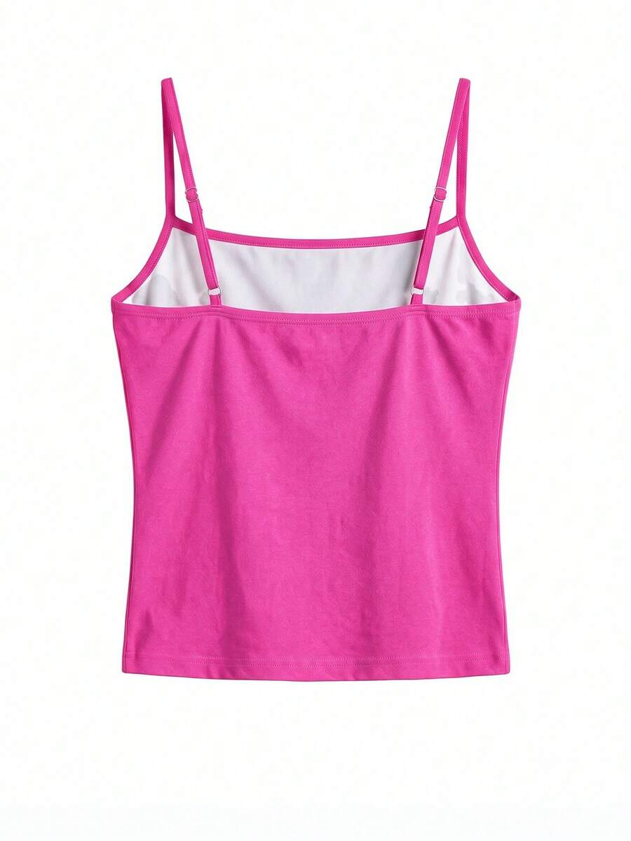 Women's blue floral print spaghetti strap camisole top in a slim fit short length design