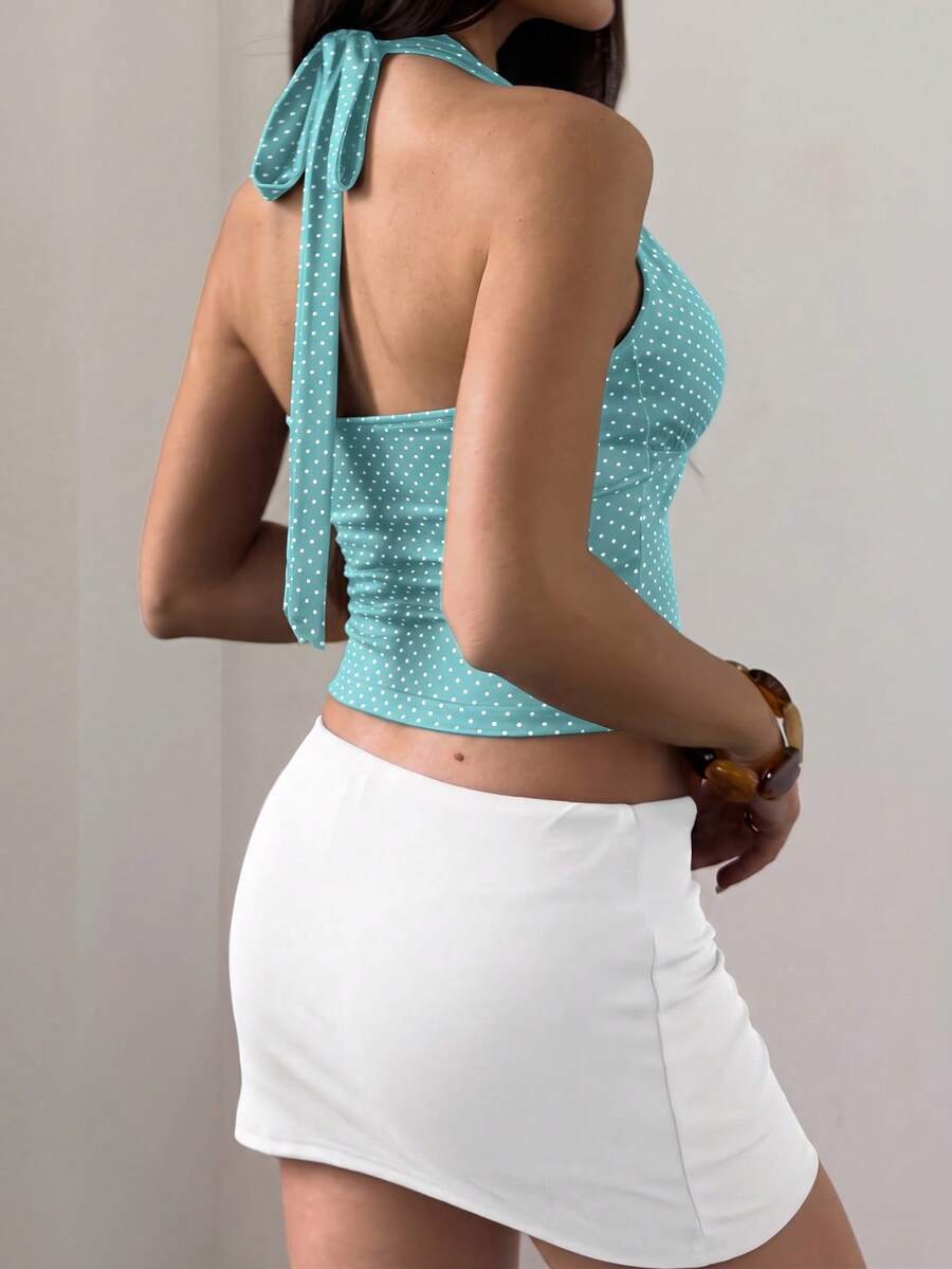 Women's sleeveless halter crop top featuring contrast lace trim and a slim fit design.