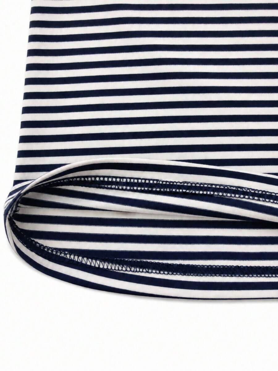 Navy blue women's geometric print spaghetti strap cami tank top with regular fit on plain background.