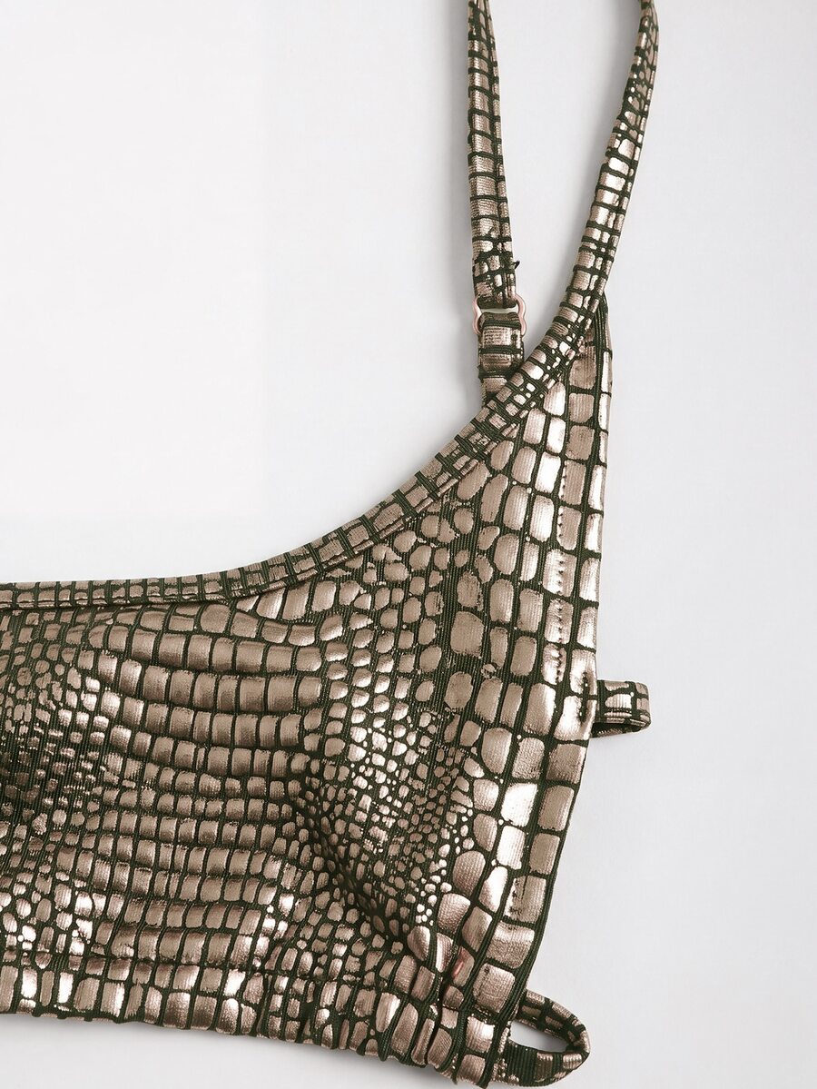 Women's black cropped camisole top with faux crocodile texture, backless spaghetti straps, and matching arm sleeves.