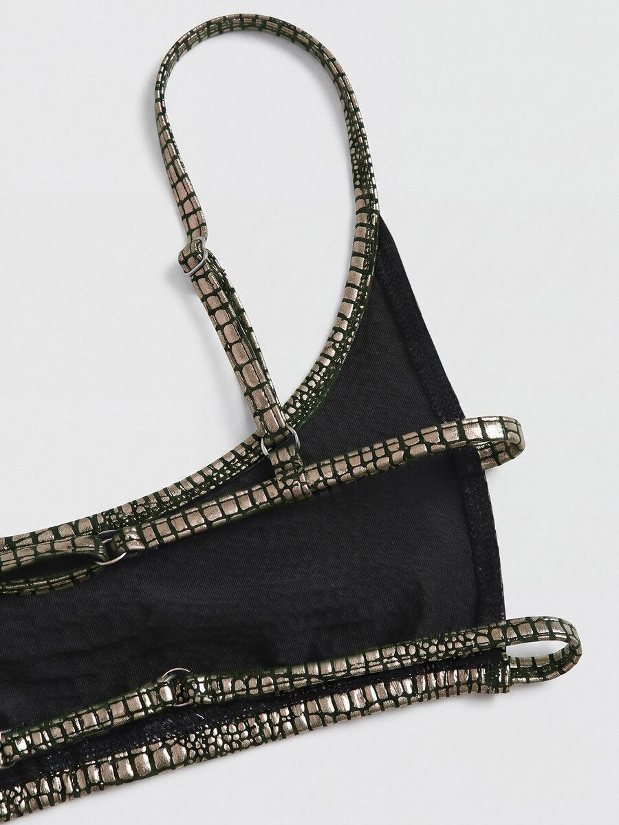 Women's black cropped camisole top with faux crocodile texture, backless spaghetti straps, and matching arm sleeves.