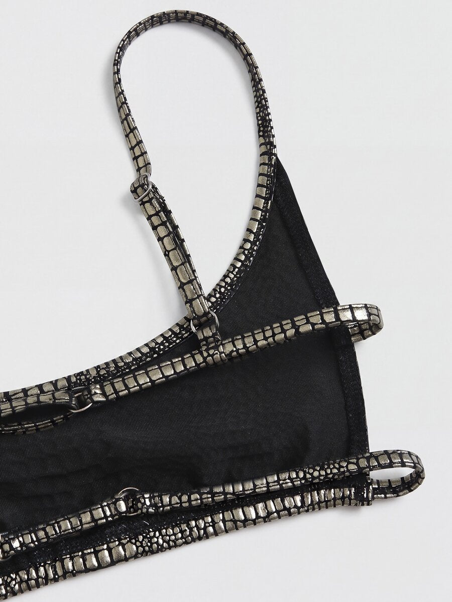 Women's black cropped camisole top with faux crocodile texture, backless spaghetti straps, and matching arm sleeves.
