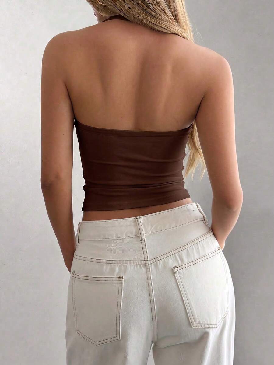 Women's striped halter camisole top featuring a backless design in knitted fabric