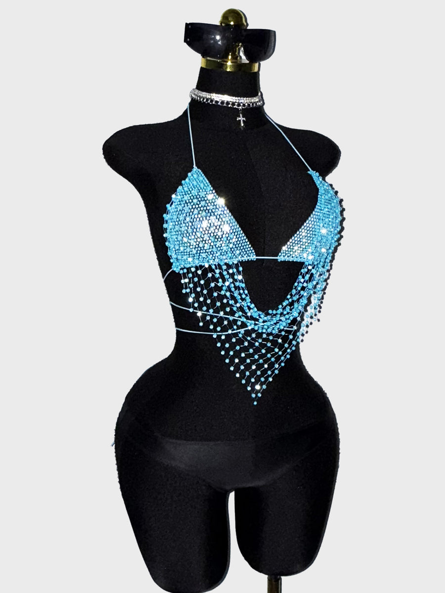 Black sheer mesh halter top for women featuring rhinestone glitter effect, backless design, chain details, and an asymmetrical hem.