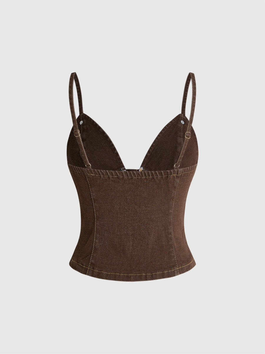 Women's blue fitted denim camisole top featuring metal buckle details, ruched cup design, zipper placket, and thin spaghetti straps.
