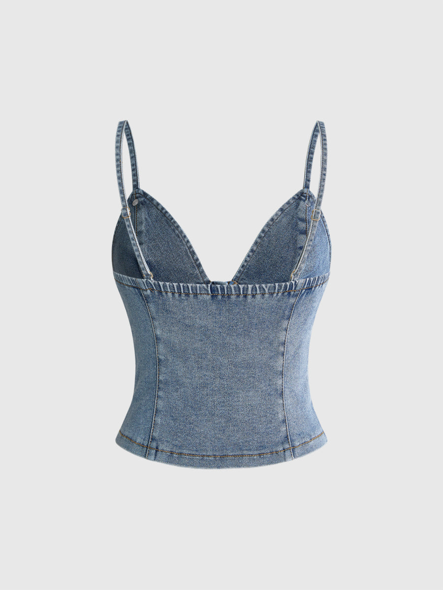 Women's blue fitted denim camisole top featuring metal buckle details, ruched cup design, zipper placket, and thin spaghetti straps.